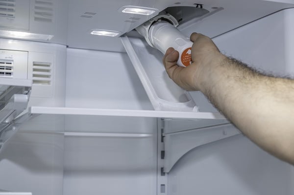 Where is the Defrost Drain in a Whirlpool Refrigerator